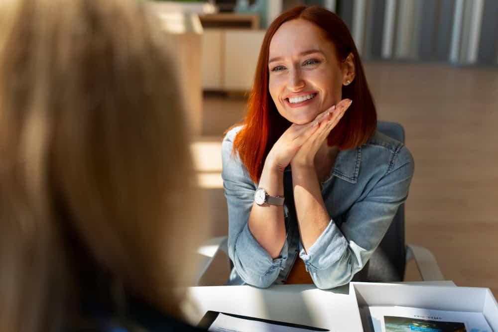 Smiling woman representing renewed confidence after anxiety treatment in Massachusetts at Rebuilding Recovery Center.