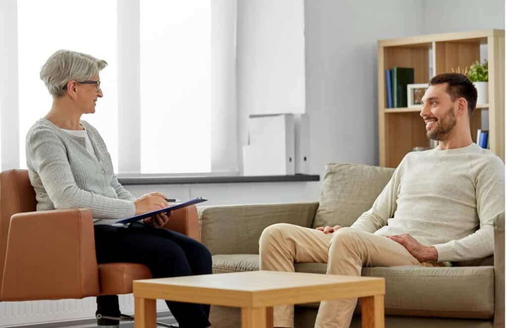 Therapist working with a client during didactic therapy for addiction in MA.