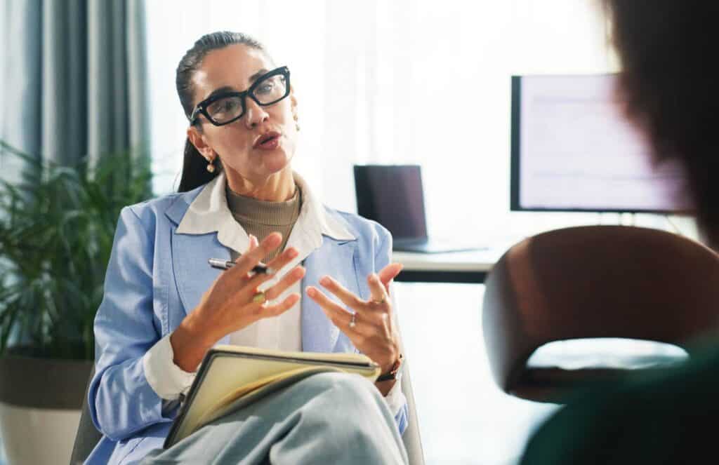 Therapist guiding a client through didactic therapy for addiction in MA.