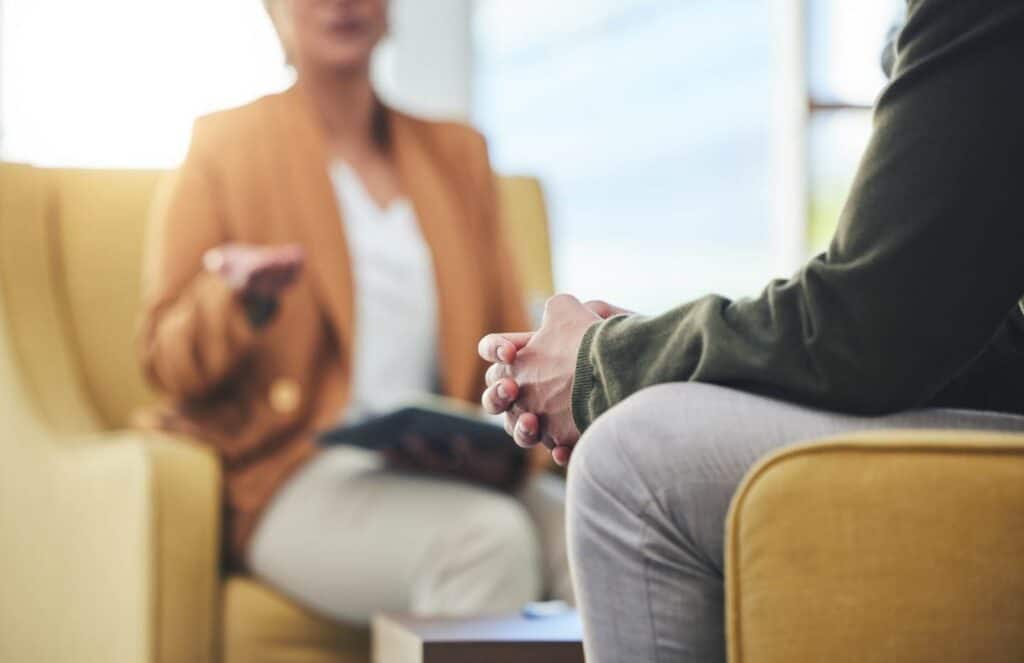 Therapist working with a client during didactic therapy for addiction in MA.