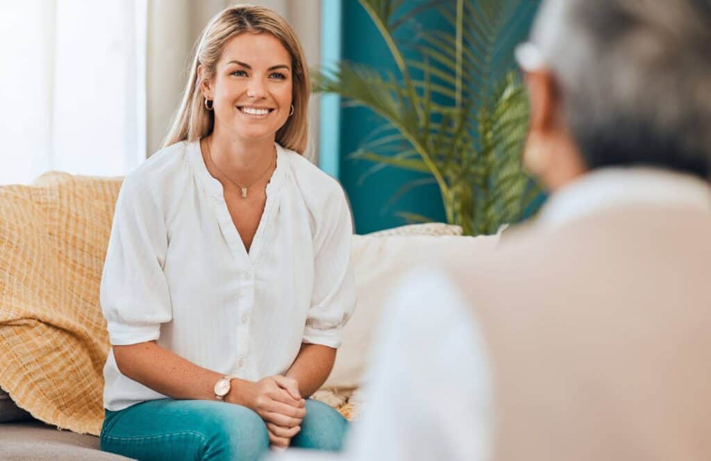 Woman meeting one-on-one with a therapist during trauma counseling in MA.
