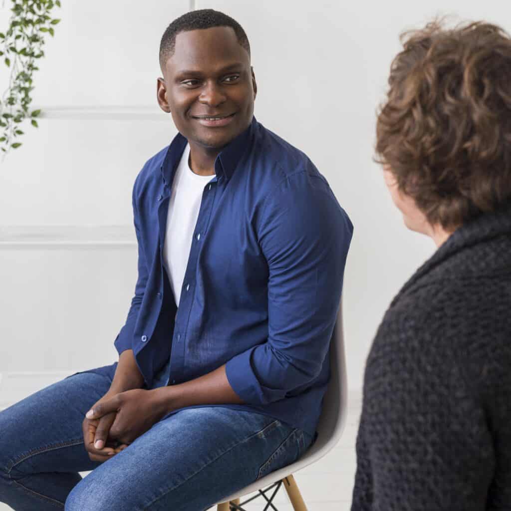 A man enjoys group therapy during Adderall addiction treatment Easton, MA