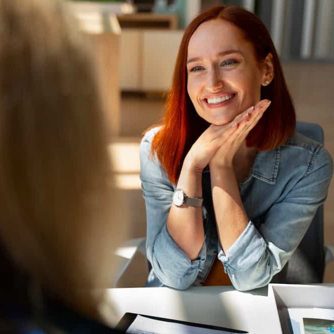 Smiling woman representing renewed confidence after anxiety treatment in Massachusetts at Rebuilding Recovery Center.