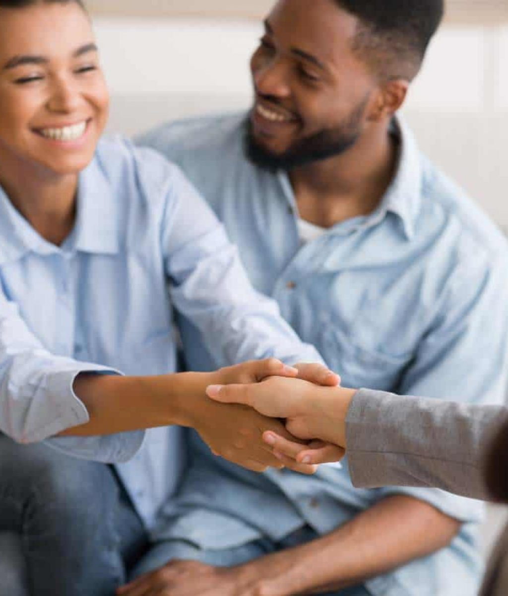 Couple meeting with a therapist for family therapy in Massachusetts.