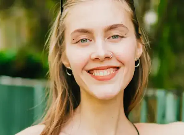Woman smiling after her substance abuse treatment session in Massachusetts.
